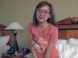 Charming busty asian adolescent fngers in glasses