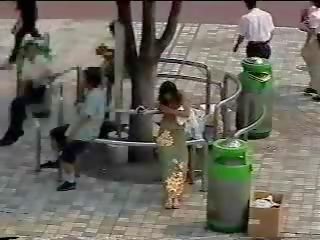 Changing in the street - Japanese lover in public first part